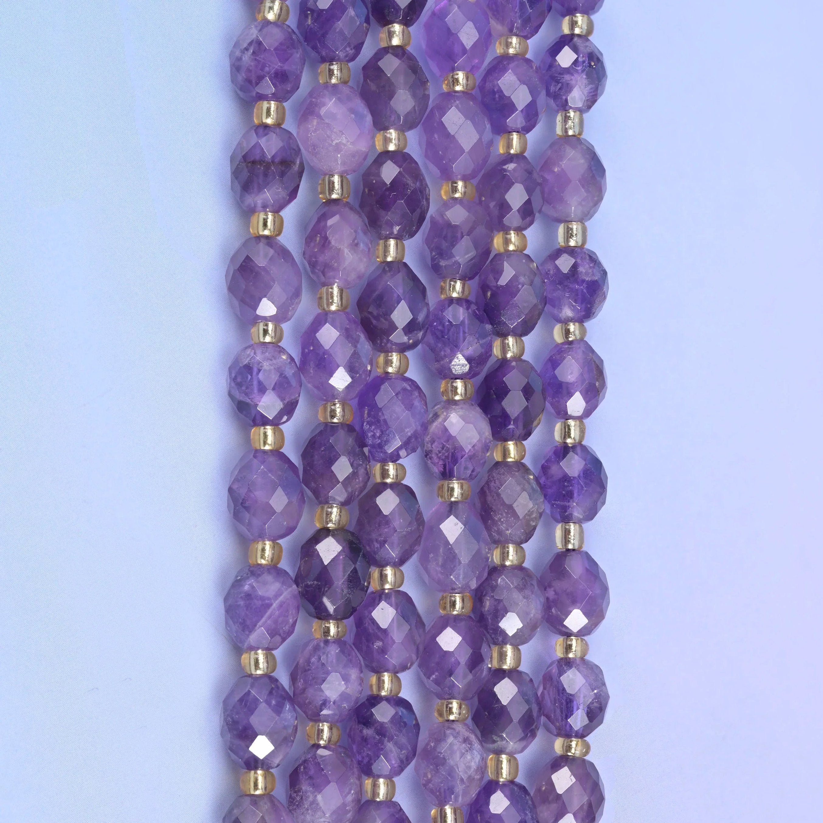 Amethyst faceted rice barrel beads, 15.5 inch strand