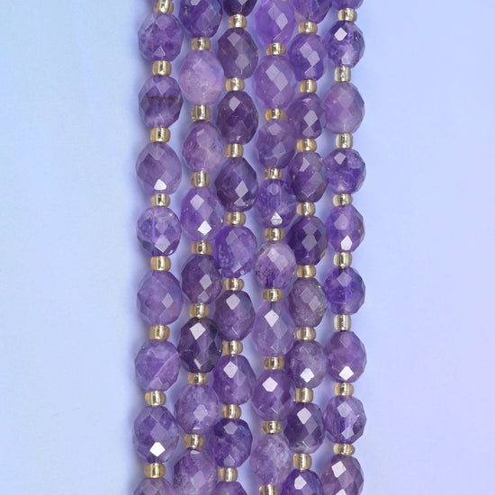 Amethyst faceted rice barrel beads, 15.5 inch strand