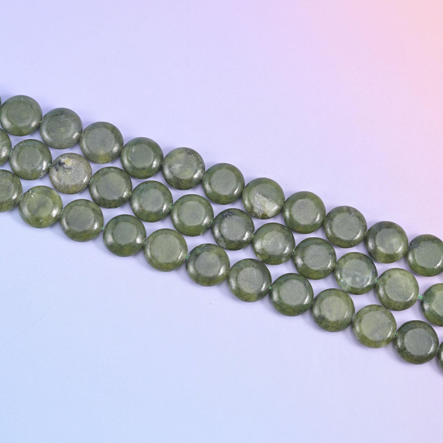 South Green Jade coin beads in deep olive green with a wet-looking polished shine