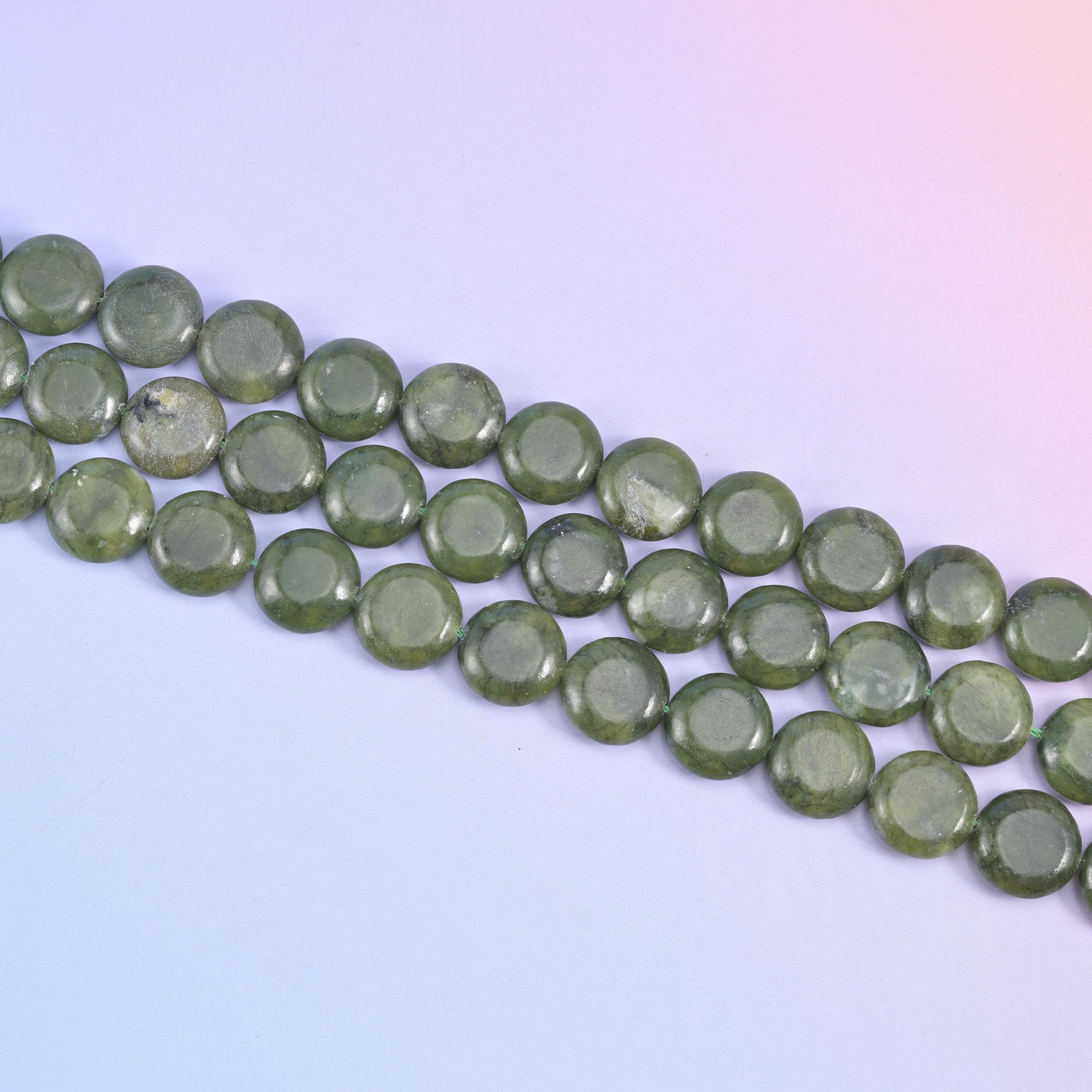 South Green Jade coin beads in deep olive green with a wet-looking polished shine