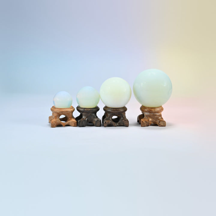 Opalite sphere crystal balls in 25mm, 30mm, 40mm and 50mm, milky man-made glass with a soft glow