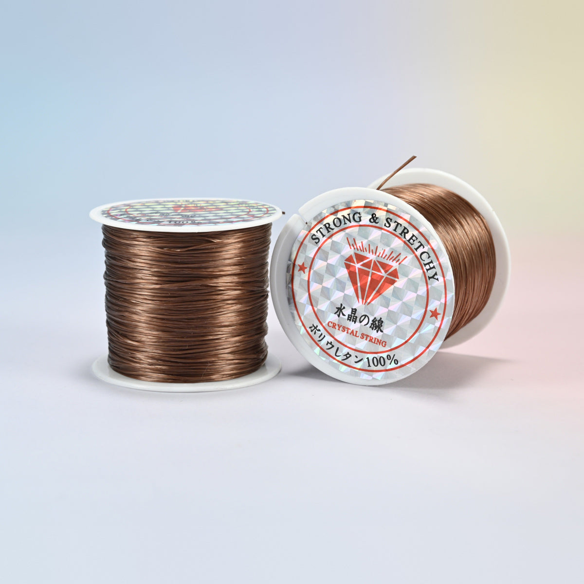 Two rolls of brown 0.7-0.8mm elastic stretch string, glossy polyurethane bead cord with a holographic label