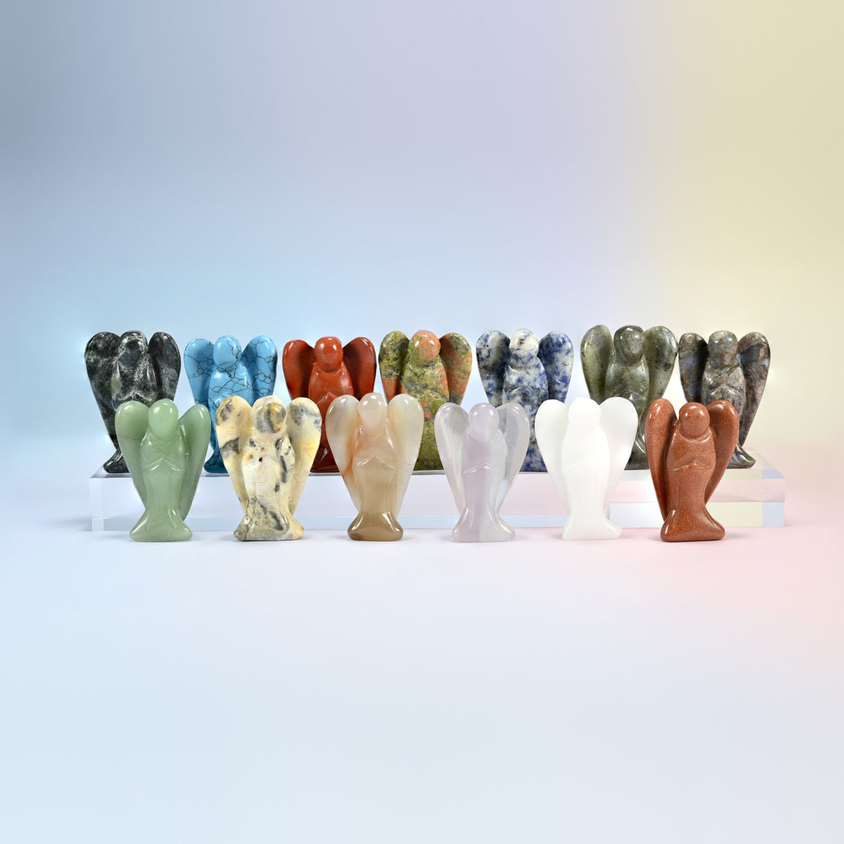 Second group of 2 inch gemstone guardian angel carvings in green, blue, red, white and pink stones