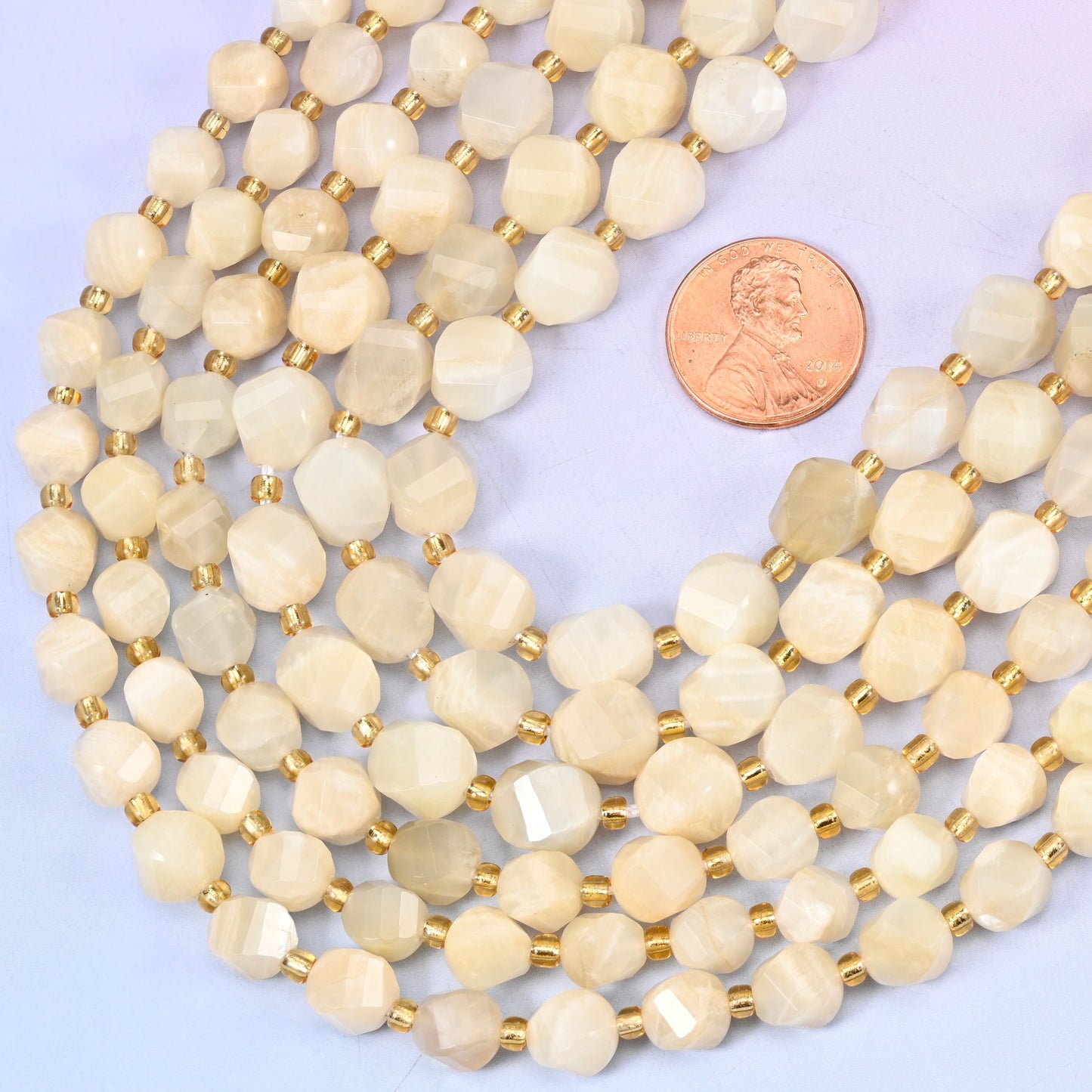 Faceted spiral twist cut White Moonstone beads