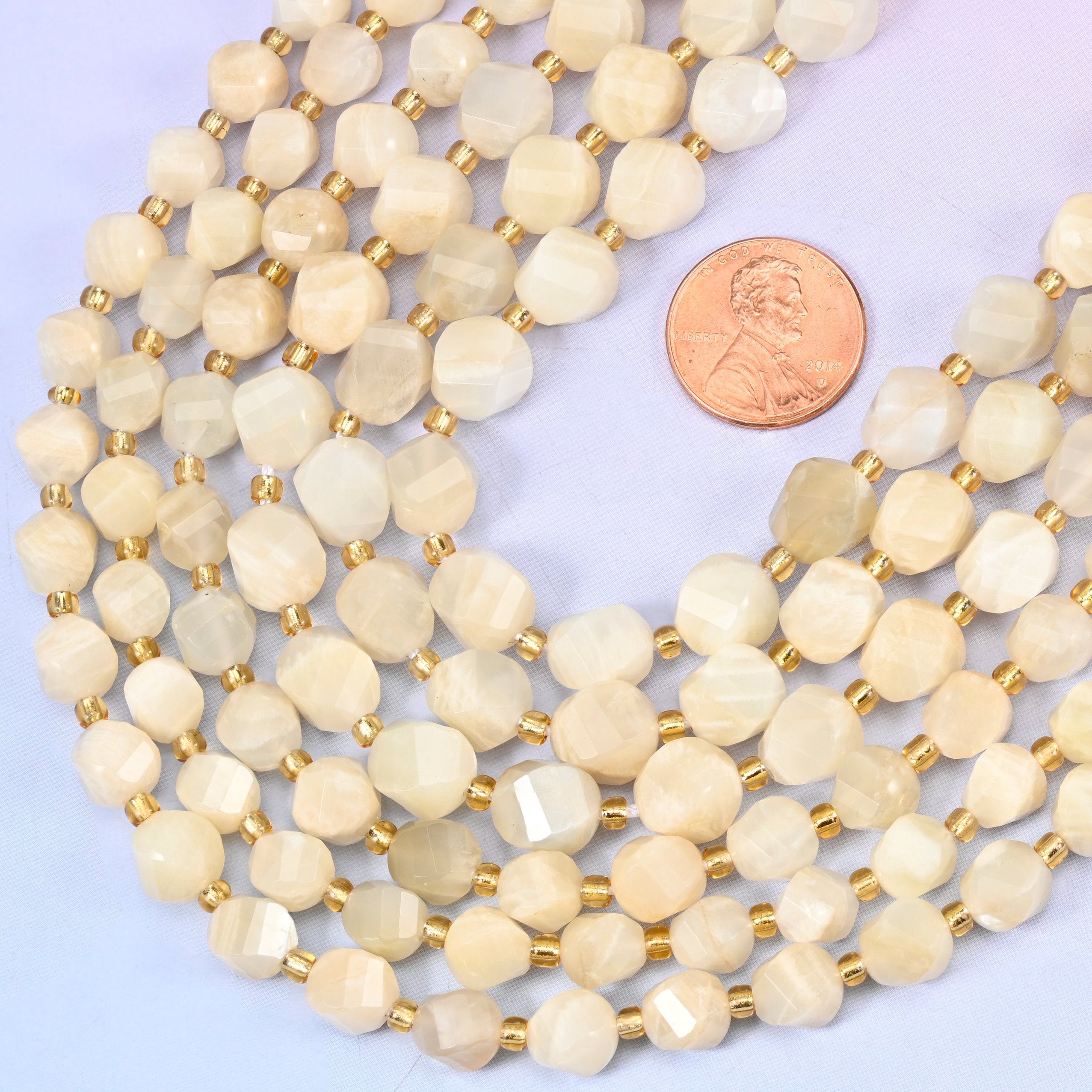 Faceted spiral twist cut White Moonstone beads