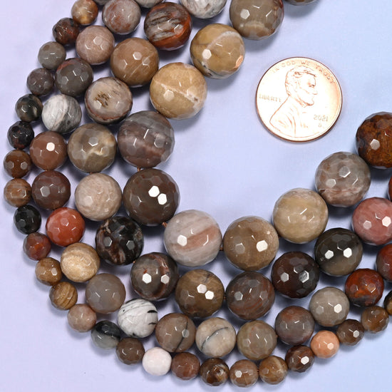 Faceted round cut petrified wood beads