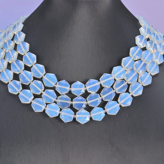 Opalite in milky white with a cool blue opalescent glow.