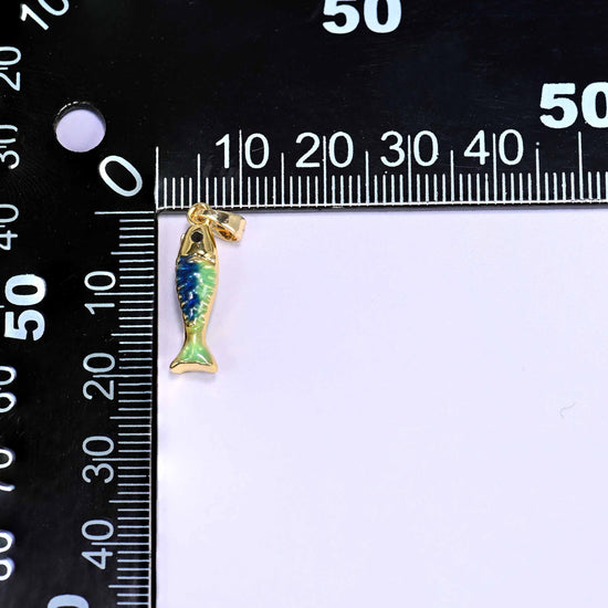 18K gold plated brass fish charm pendant with a textured scale body in blue and green enamel and a glossy gold tail and fins.