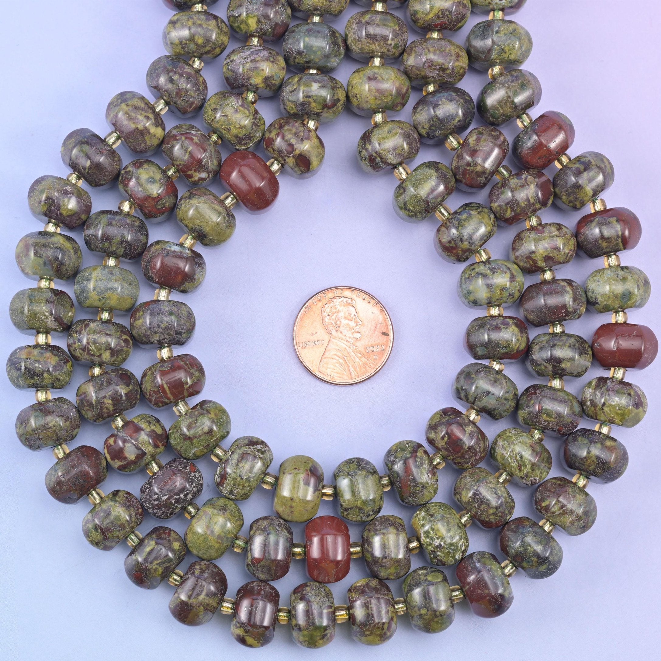 Dragon Bloodstone smooth pumpkin beads in earthy green and deep red tones with a smooth, polished finish