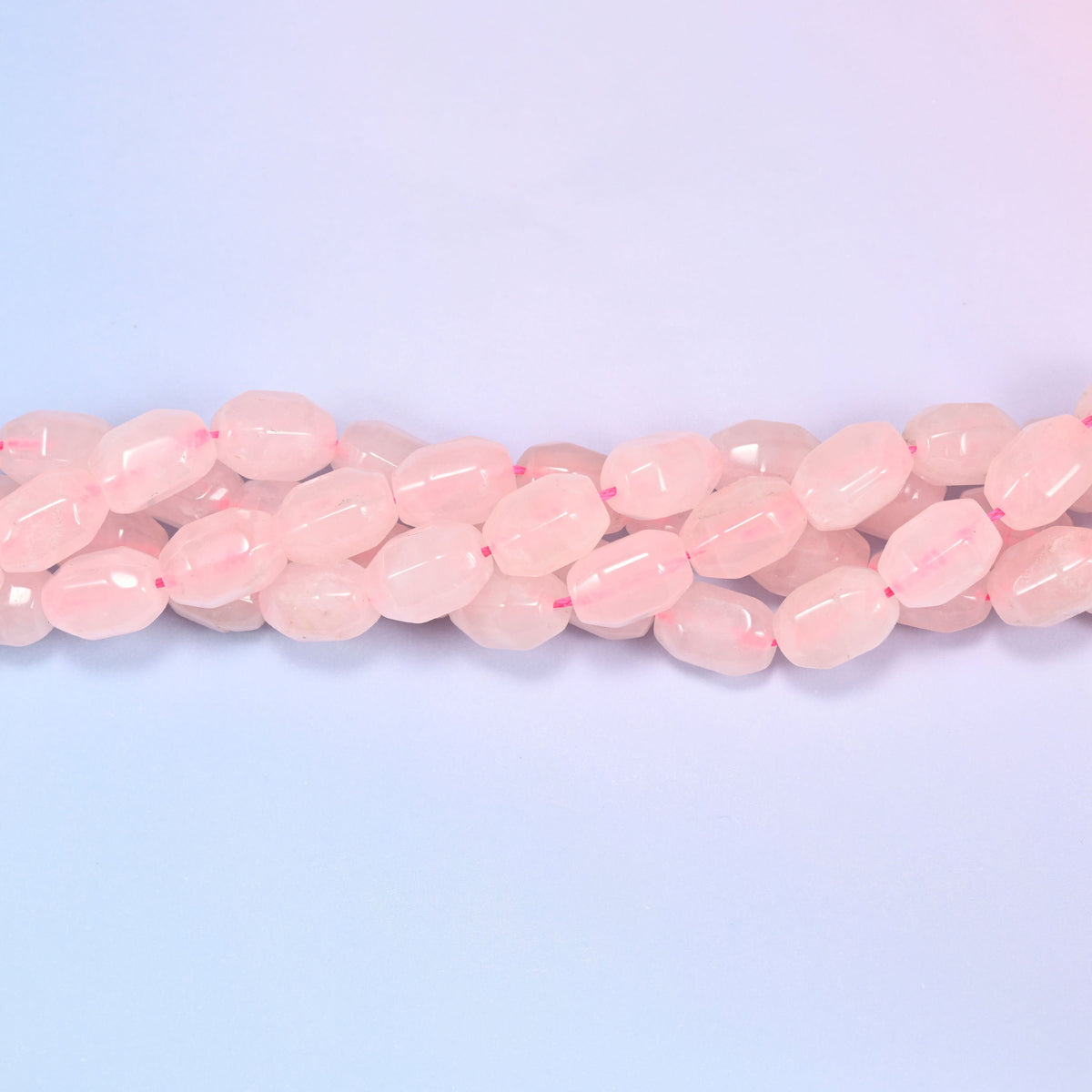 Natural Rose Quartz Faceted Barrel Beads, full strand of approximately 28 beads.