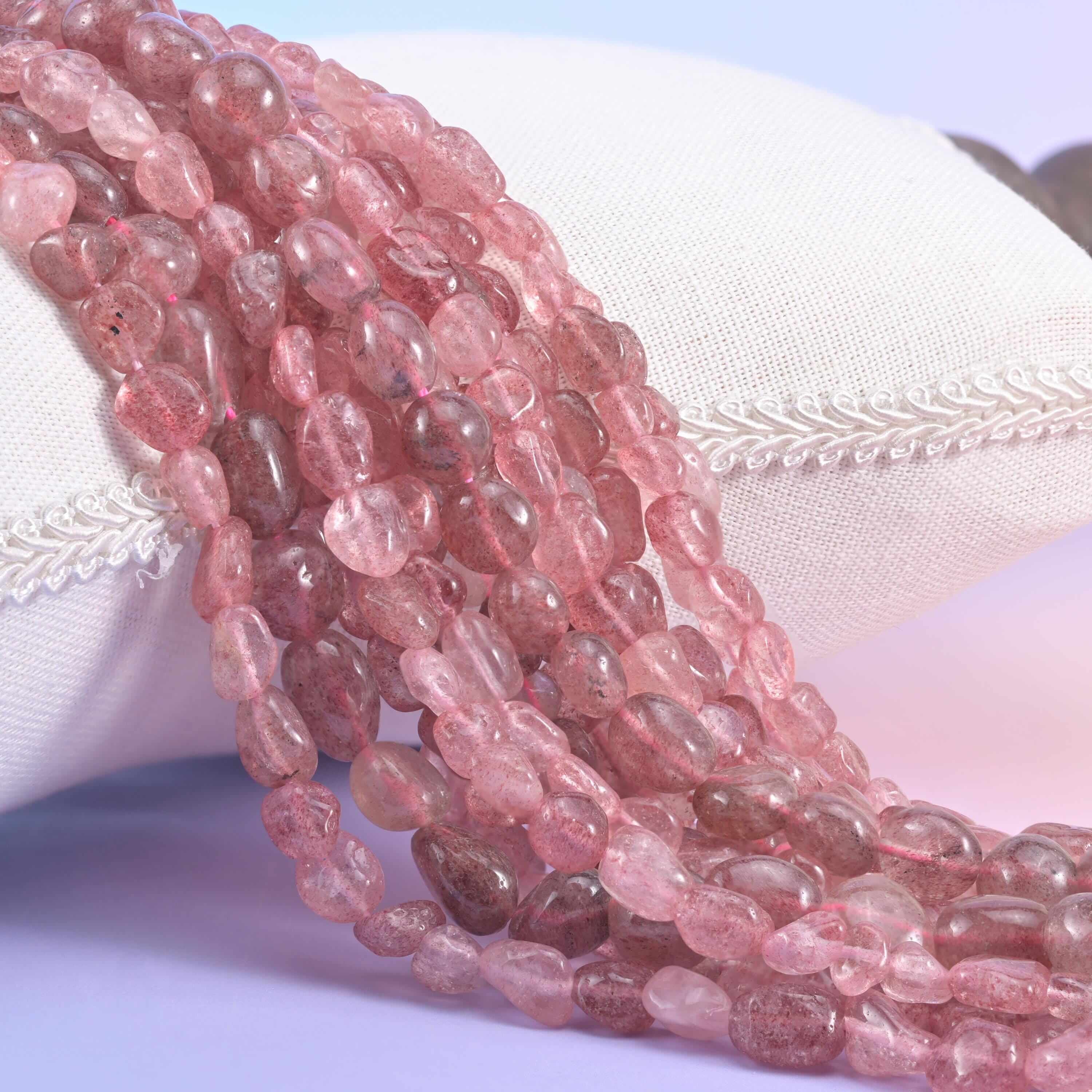 Strawberry Quartz Pebble Nugget Beads, translucent dusty rose quartz shot through with fine reddish-brown inclusions