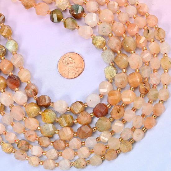 Red Grass Silk Stone Faceted Spiral Twist Beads, soft peach and apricot stone drifting into oatmeal cream and warm tan