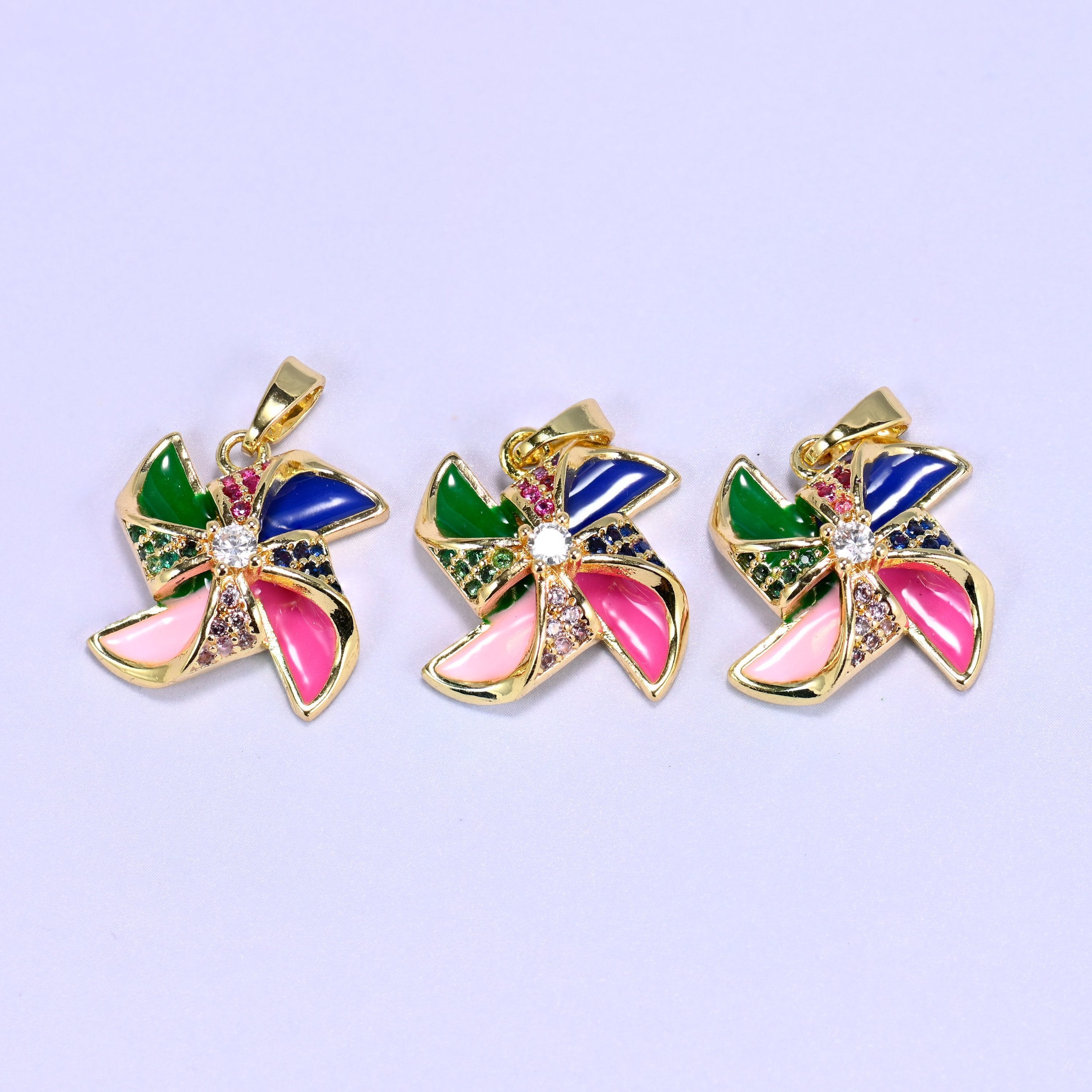 Colorful Windmill Zircon Charms with multicolor zircon accents along the spokes