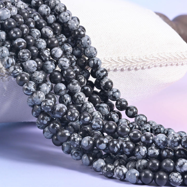 Snowflake Jasper Smooth Round Beads, charcoal rounds crazed with pale grey and white markings
