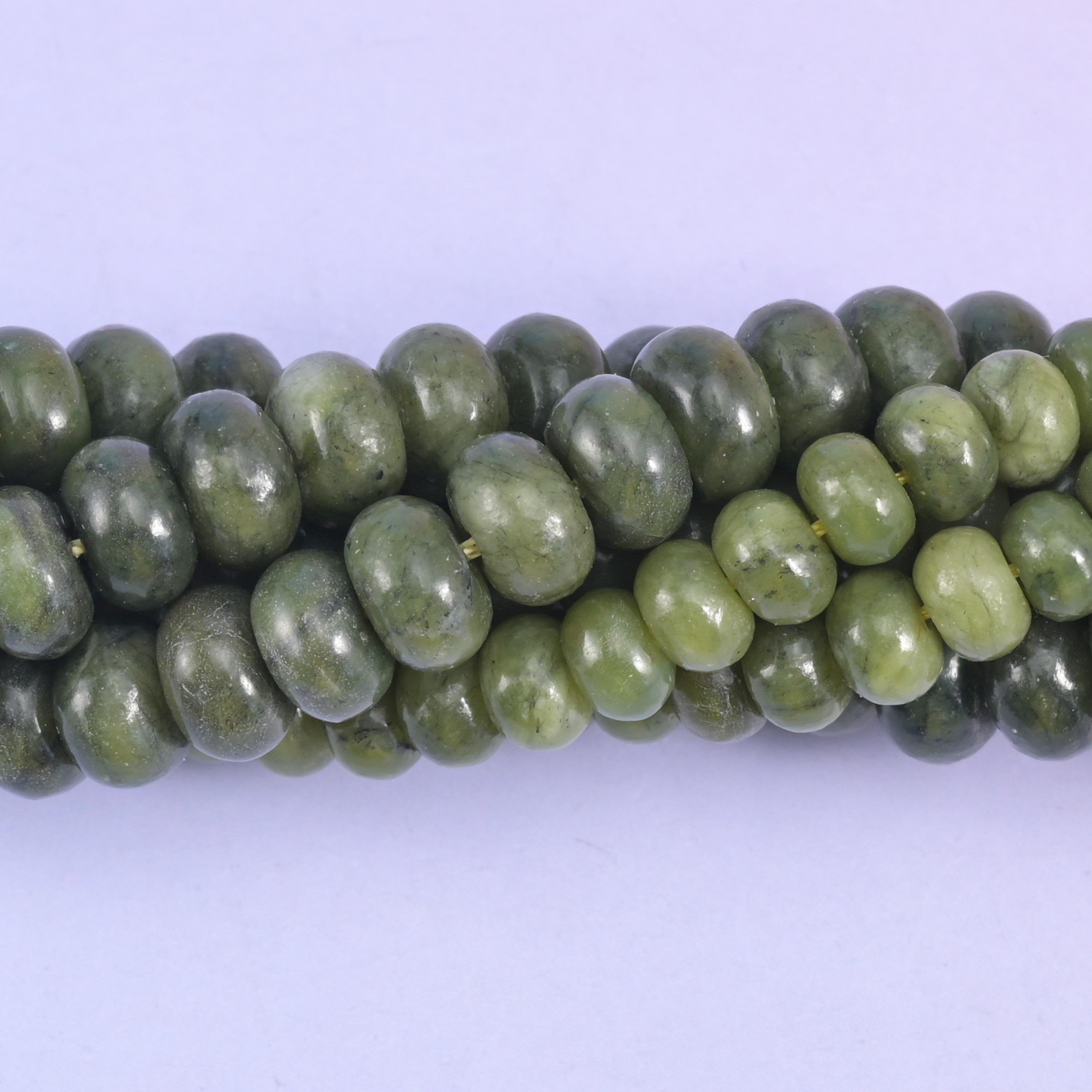 Smooth rondelle cut south green jade beads