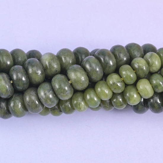 Smooth rondelle cut south green jade beads