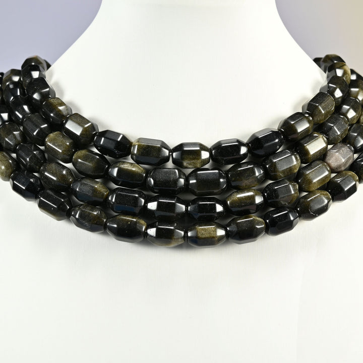 Gold Obsidian faceted barrel drum beads layered as a collar, several strands stepping down in a row