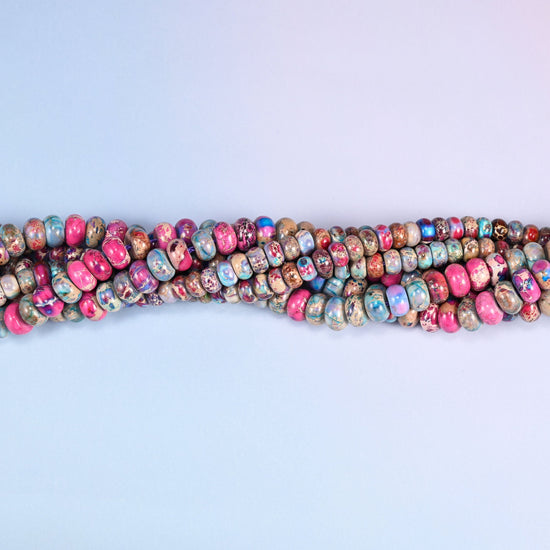 Jewel-toned mix of magenta and orchid purple against sky blue, cream and dusty rose Sea Sediment Jasper rondelles
