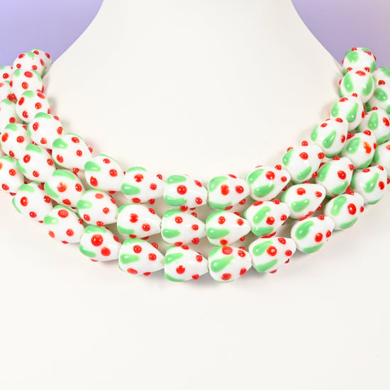 Strawberry glass beads, white with red dots, approximately 15.5x12mm