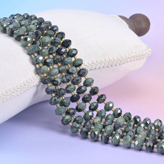 Kambaba Jasper faceted rondelle beads in deep forest green with pale sage speckling