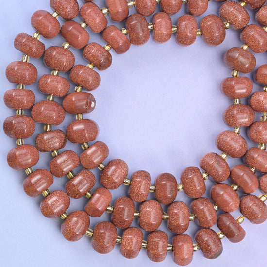 Gold sandstone pumpkin beads, approximately 35 beads per strand