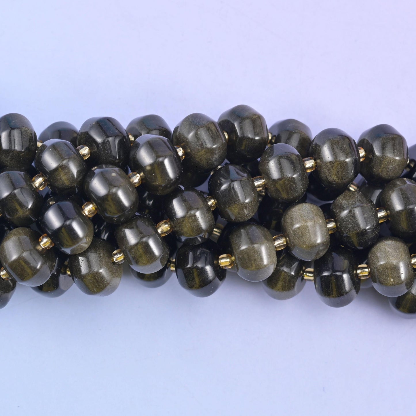 Smooth pumpkin cut gold obsidian beads