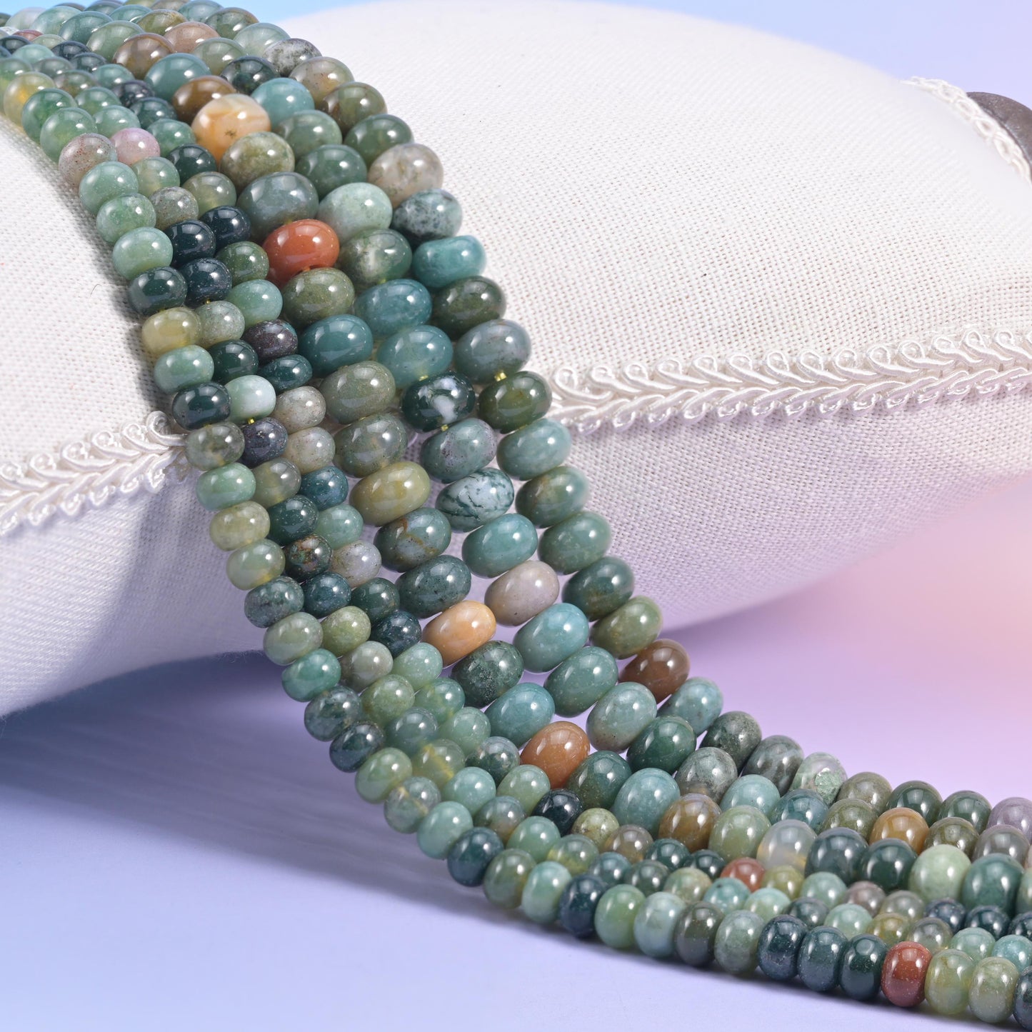 Indian Agate smooth rondelle beads in mossy green and grey-green with cream, mauve, and rust accents