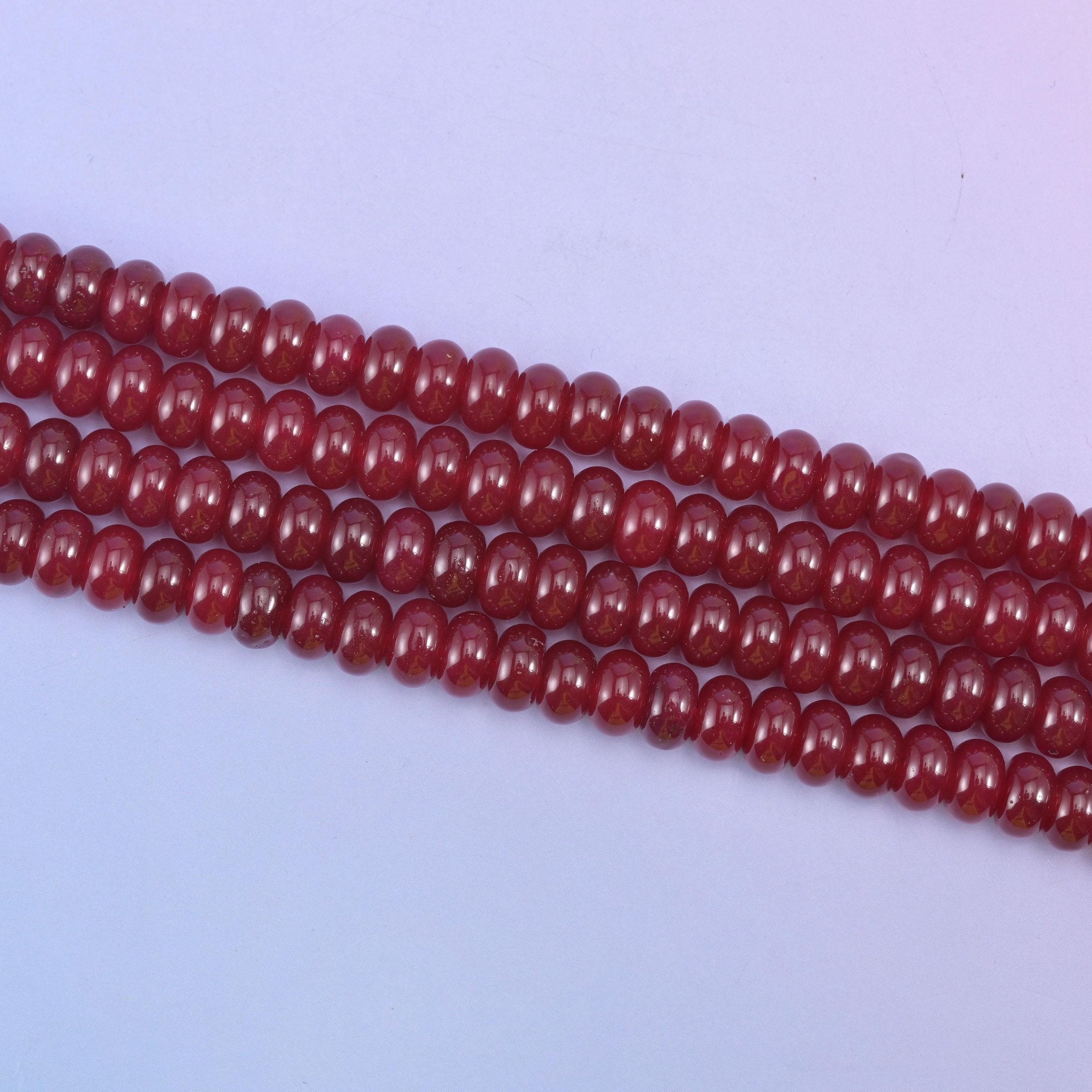 Ruby Red Dyed Jade beads in a deep, glossy wine-red tone
