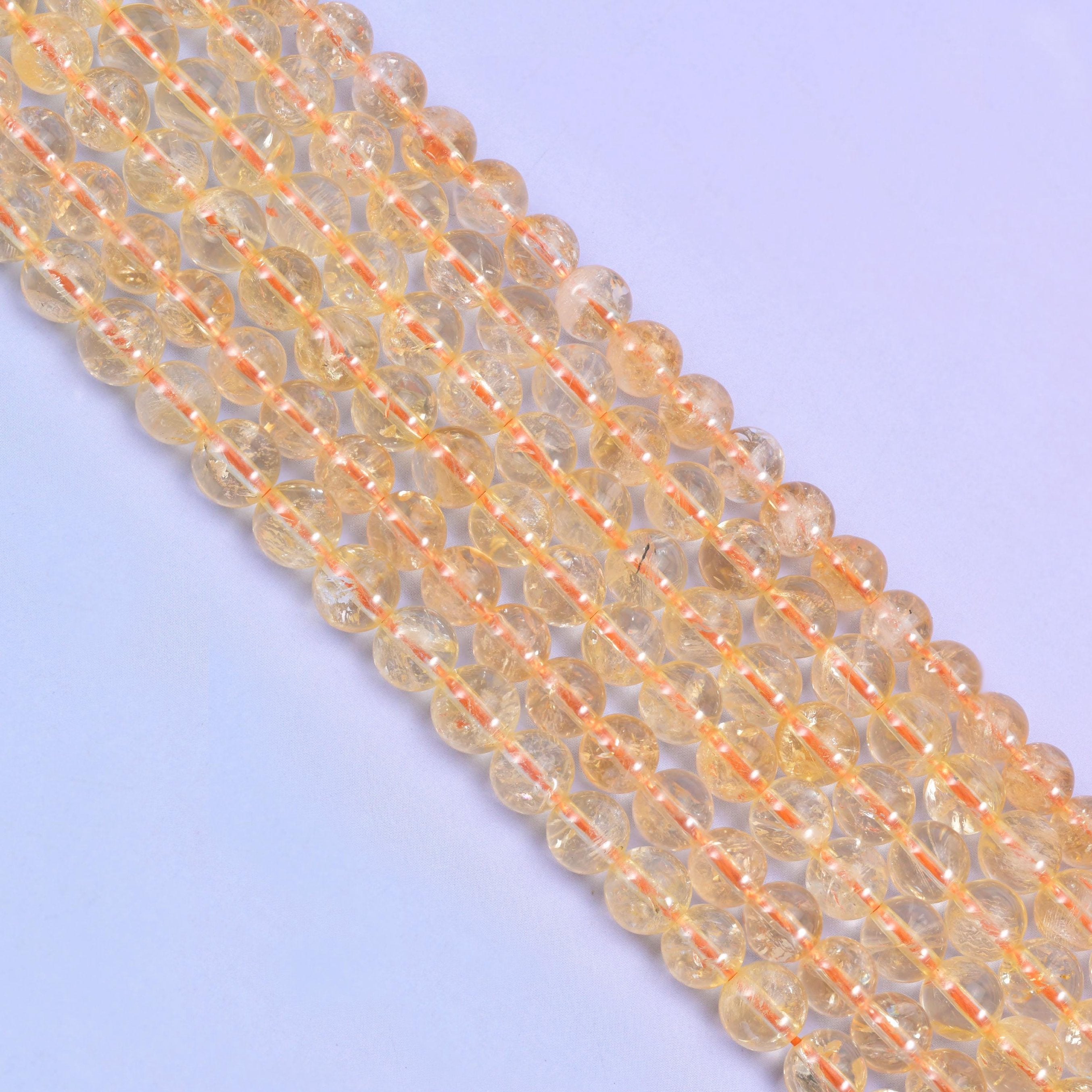 Smooth round cut citrine beads