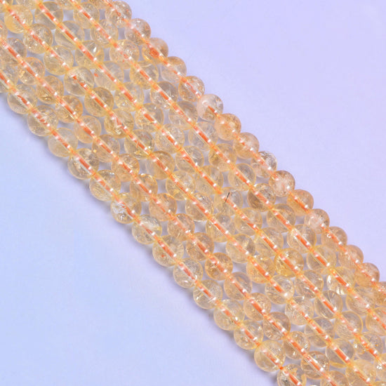Smooth round cut citrine beads