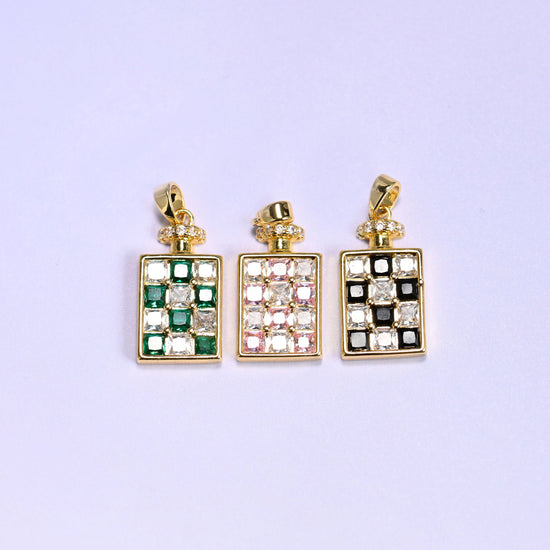 Perfume bottle zirconia charm colourway lineup, green, pink and black checkerboard pendants standing in a row, each with a gold bail and zirconia collar.