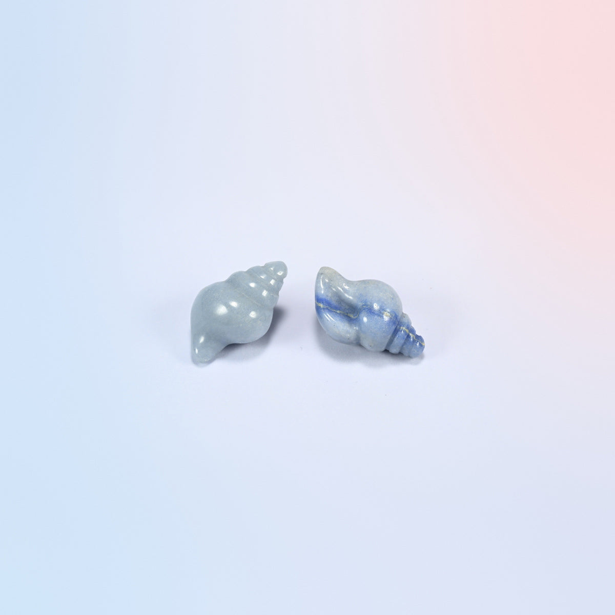 Two natural blue aventurine conch shell crystal carvings, 1.5 inch, light blue