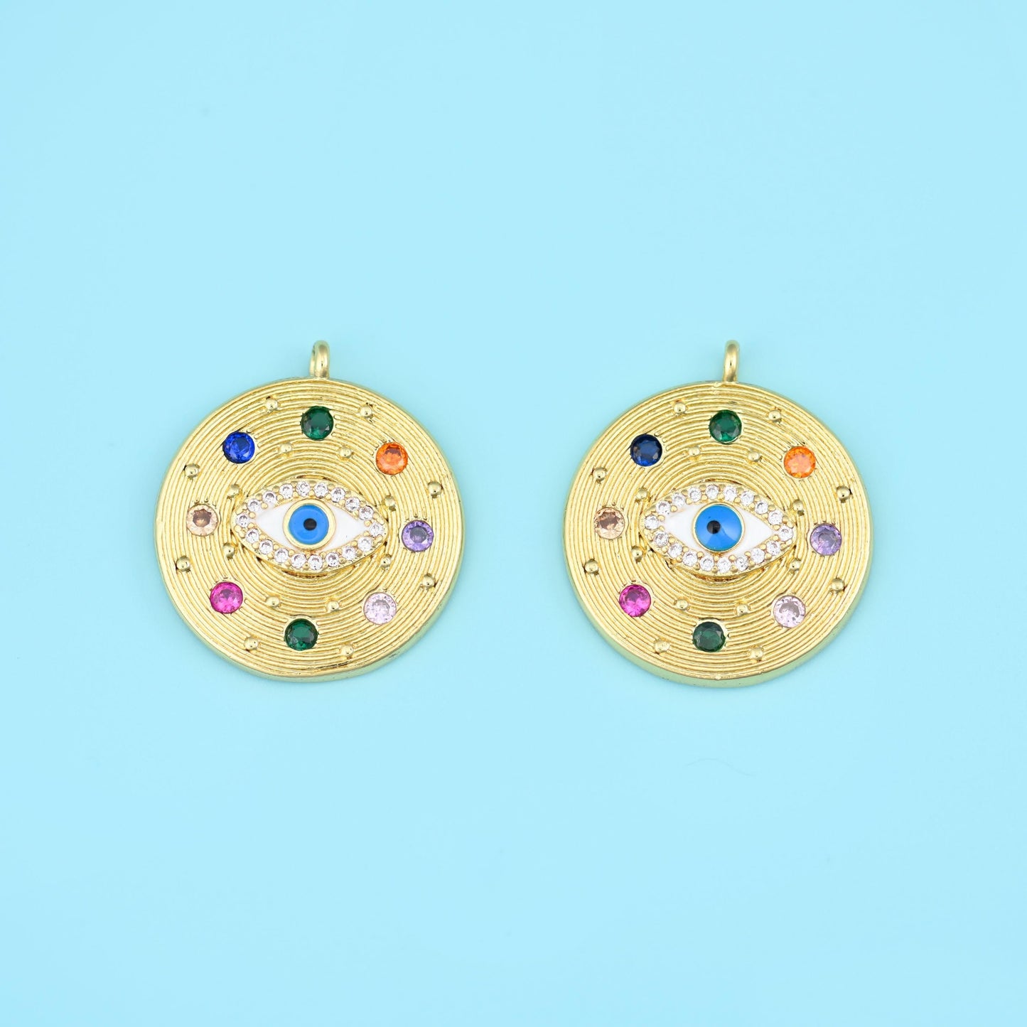 Zircon Evil Eye Charm 22.92x20.18mm in white and blue zircon with green, red, pink and amber stones