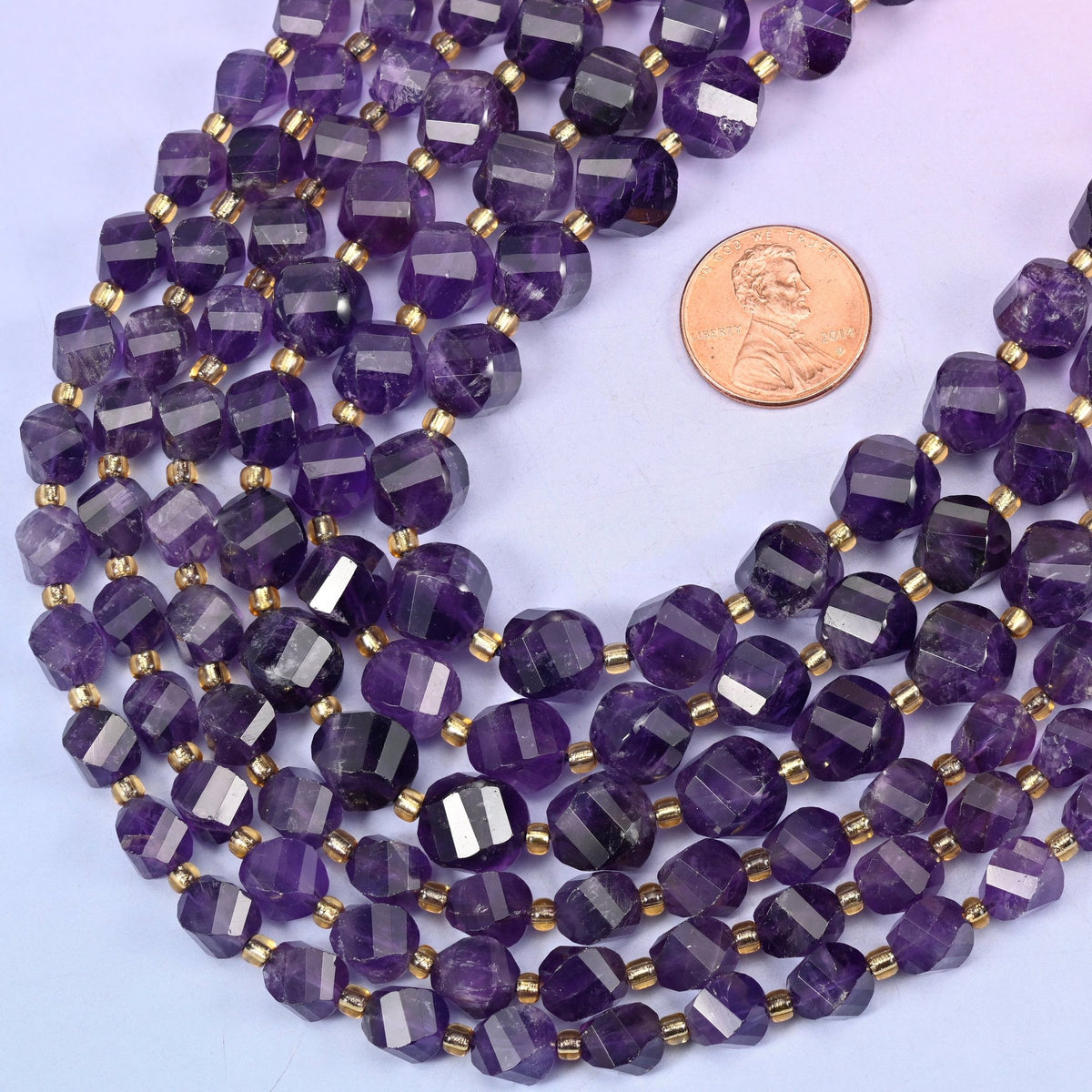 Faceted spiral twist cut Dark Purple Amethyst beads