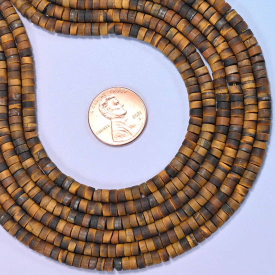 Natural tiger eye matte heishi disc beads in warm golden brown tones with the stone's signature chatoyant shine.