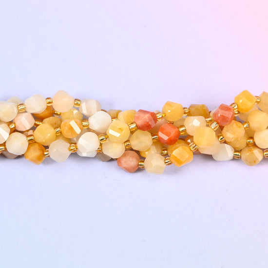Gold silk jade yellow jade beads in a 15 inch strand, warm golden tones suited to brass and gold filled findings