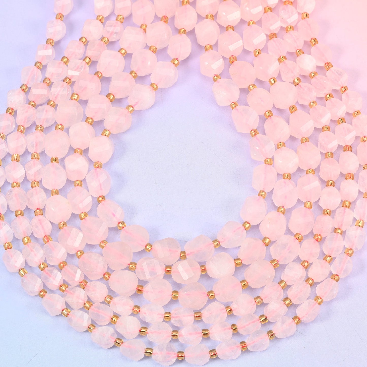 Faceted spiral twist cut natural rose quartz beads