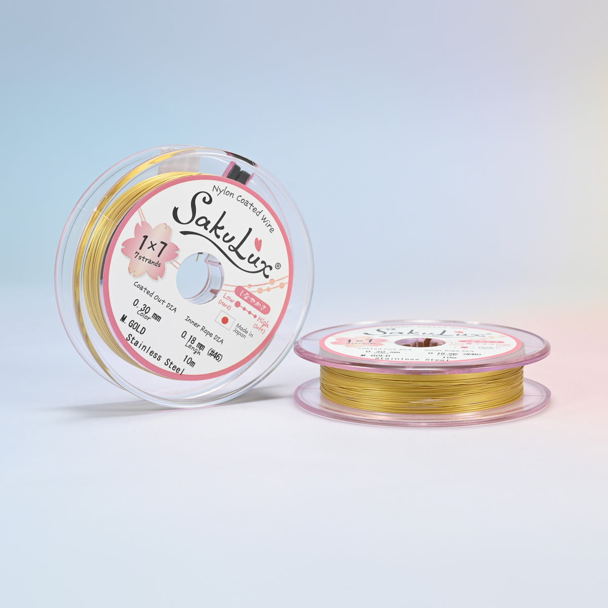 Two rolls of gold 0.3mm nylon coated stainless steel beading wire, 7 strand with 0.18mm inner wire, 10 meter roll