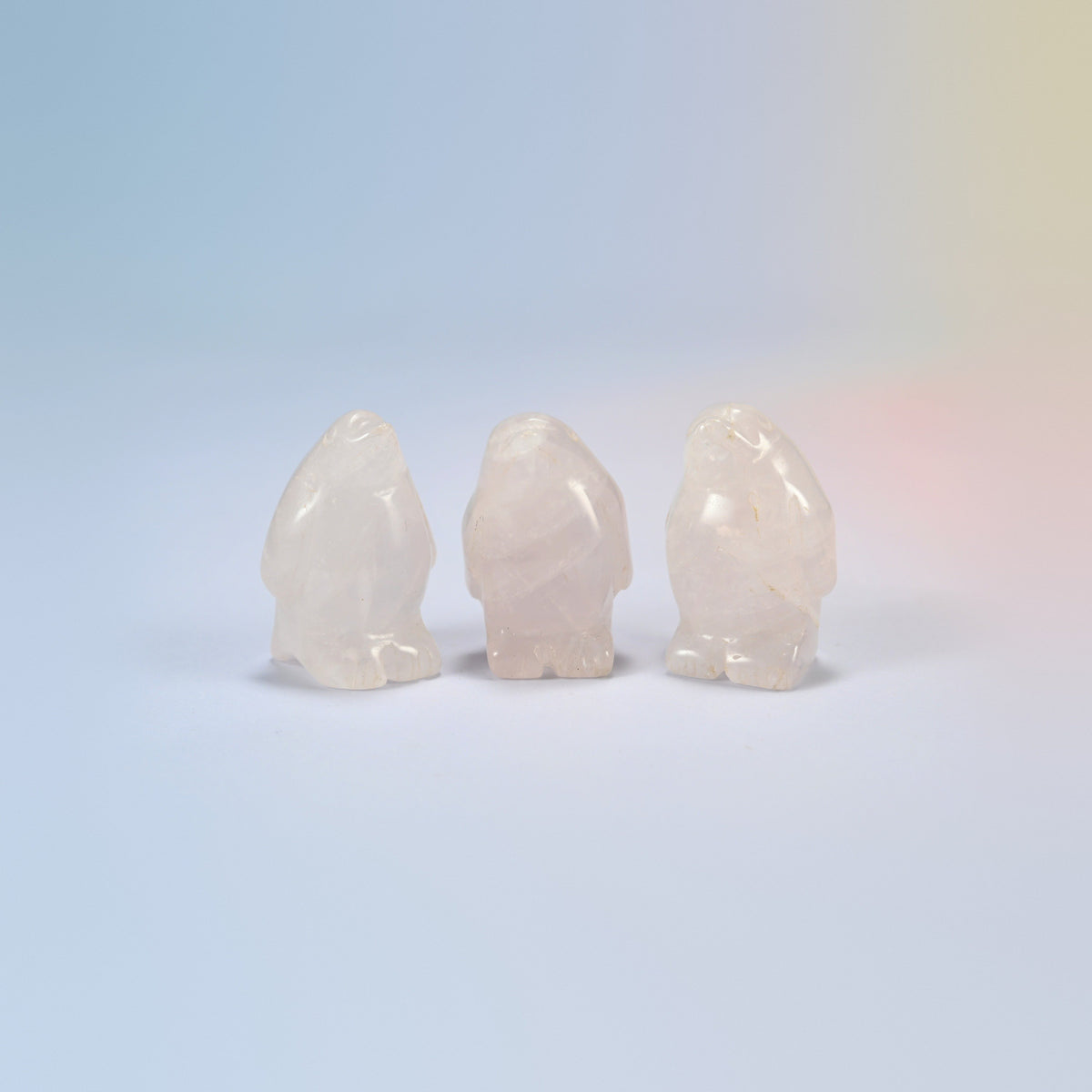 Three rose quartz penguin crystal carvings, 1.5 inch, light pink natural stone