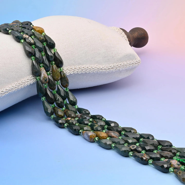 Indian Agate Faceted Teardrop Beads, near-black forest green with mossy banding.