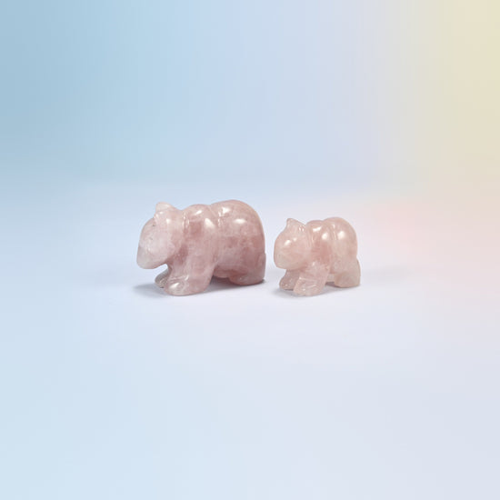 A 2 inch and a 1.5 inch rose quartz bear crystal carving, light pink natural stone