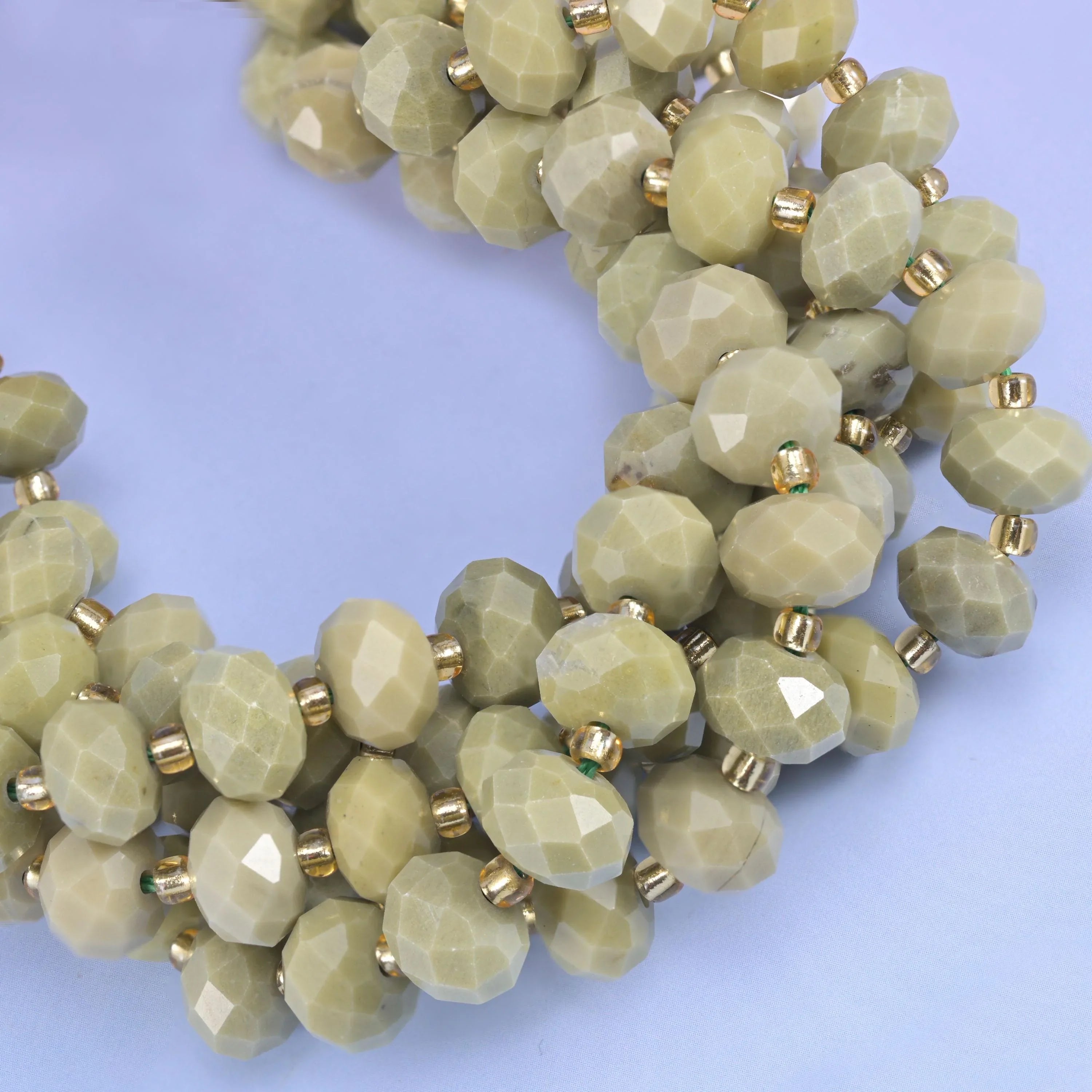 Faceted rondelle cut avocado jade beads