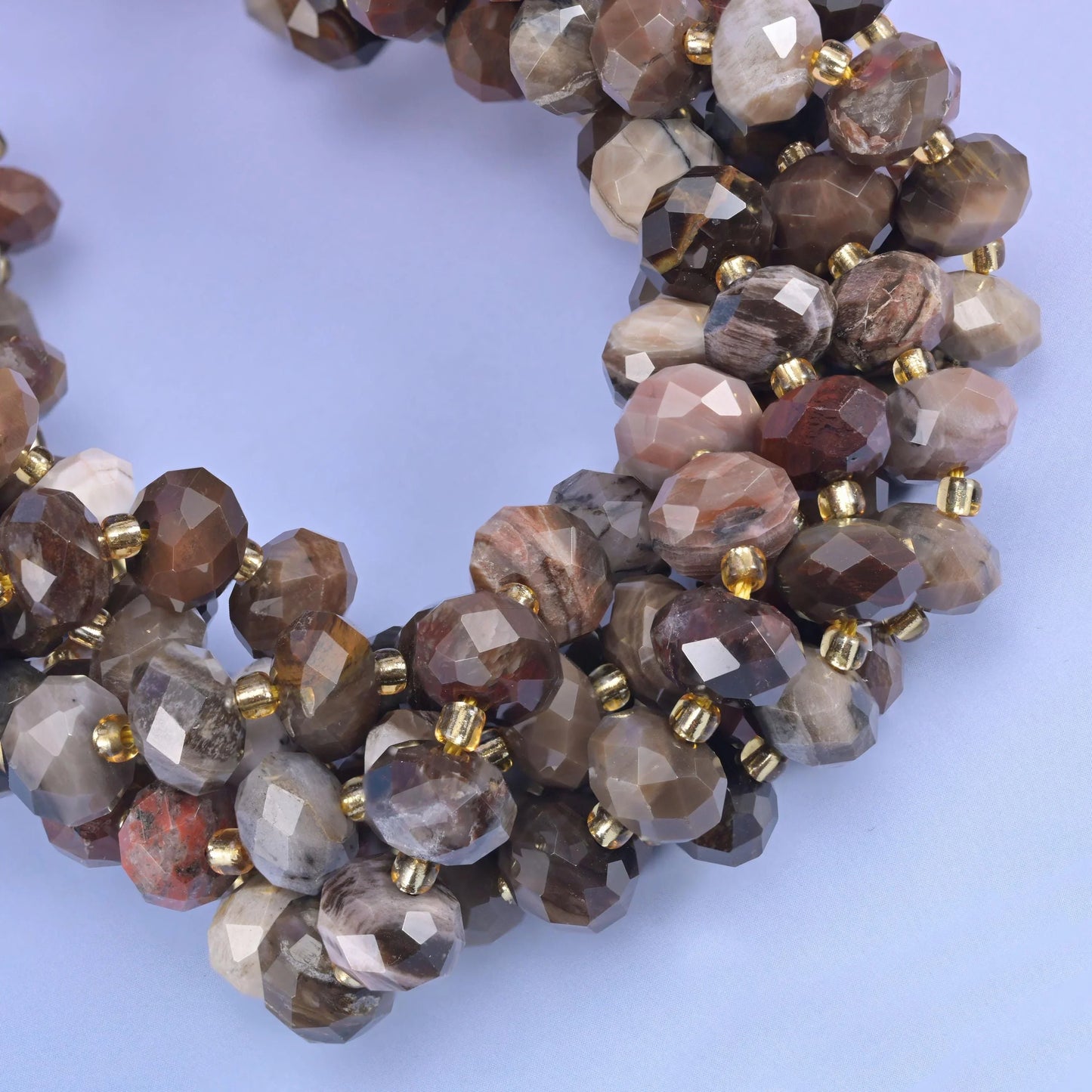 Faceted rondelle cut petrified wood beads