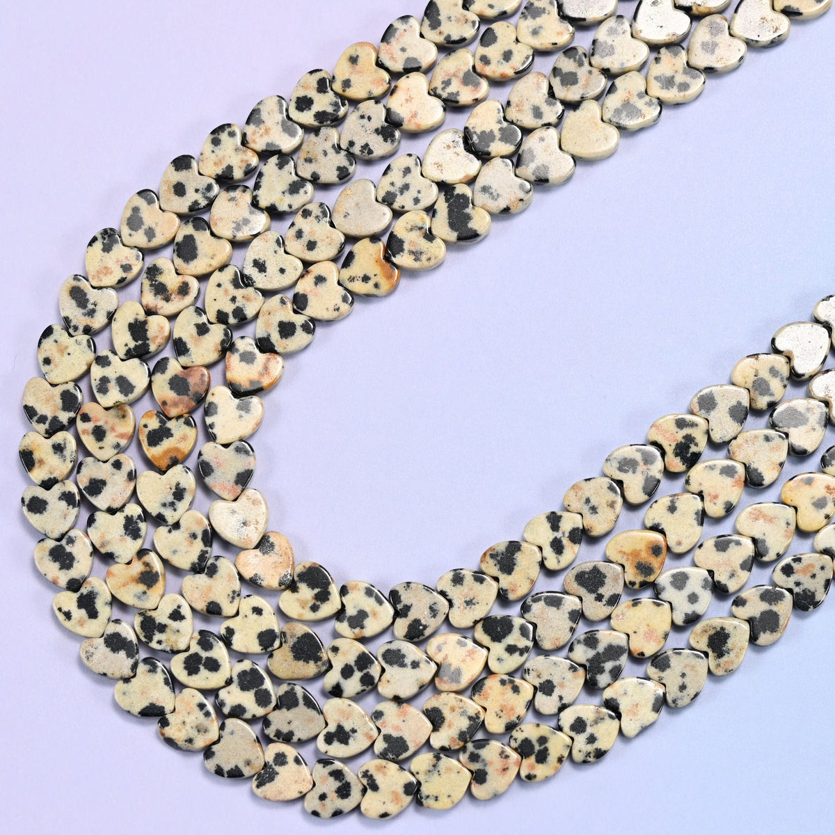 Dalmatian Jasper Flat Heart Beads in cream with black spots