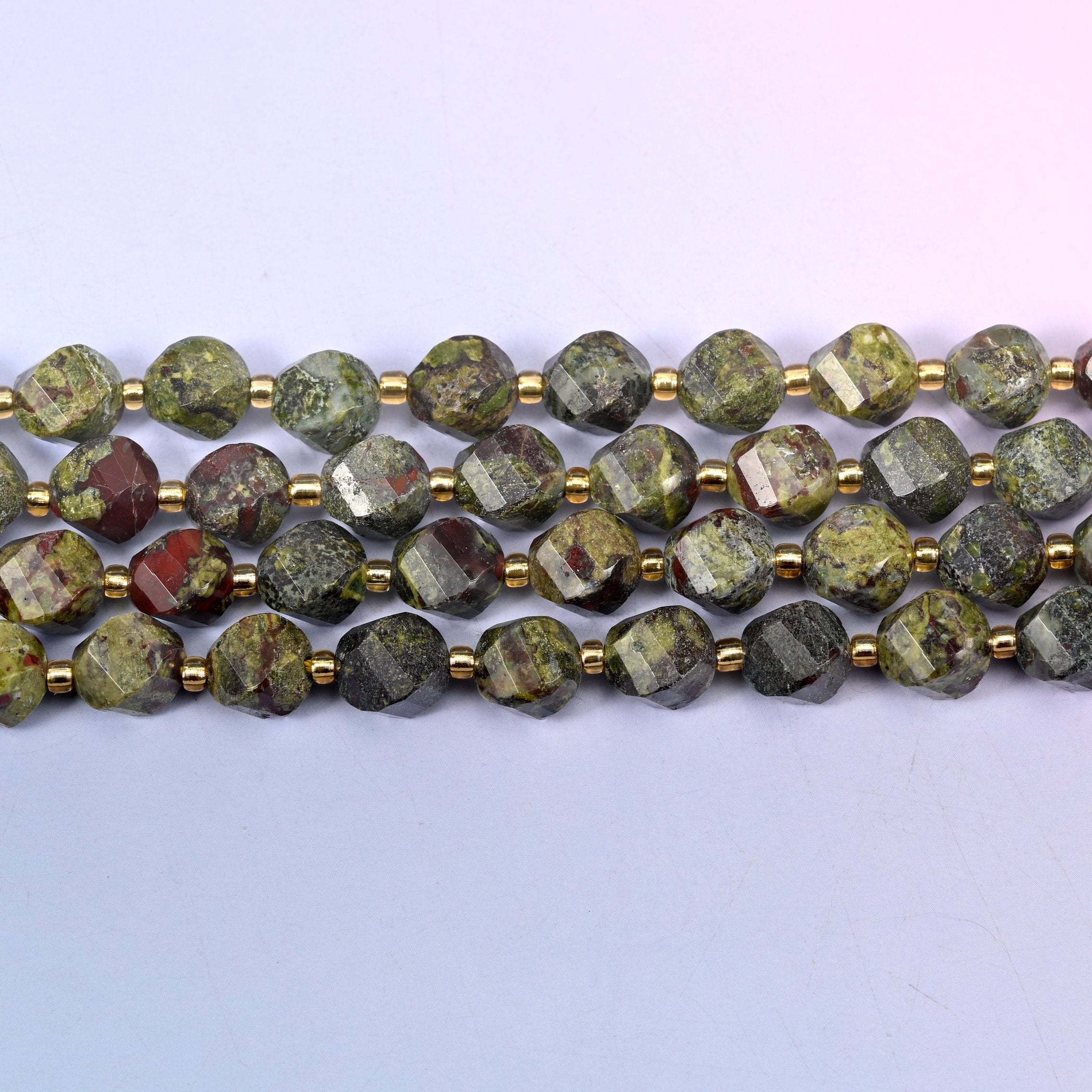 Dragon Bloodstone natural stone beads running from almost solid green to several bold red patches