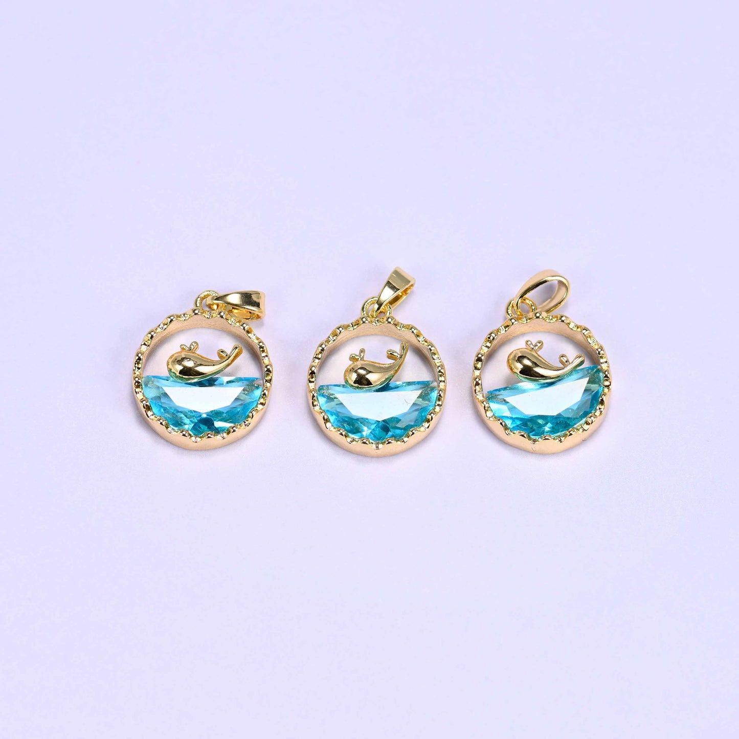 Gold round zirconia whale charm, approximately 17mm x 14mm