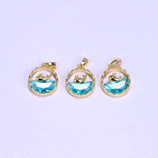 Gold round zirconia whale charm, approximately 17mm x 14mm