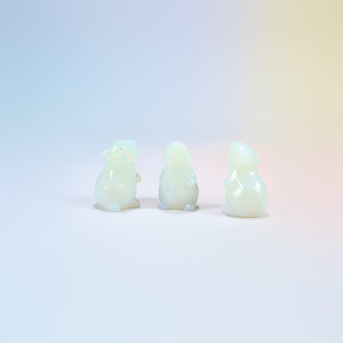 Three opalite mouse carvings, 1.5 inch, glowing man-made glass