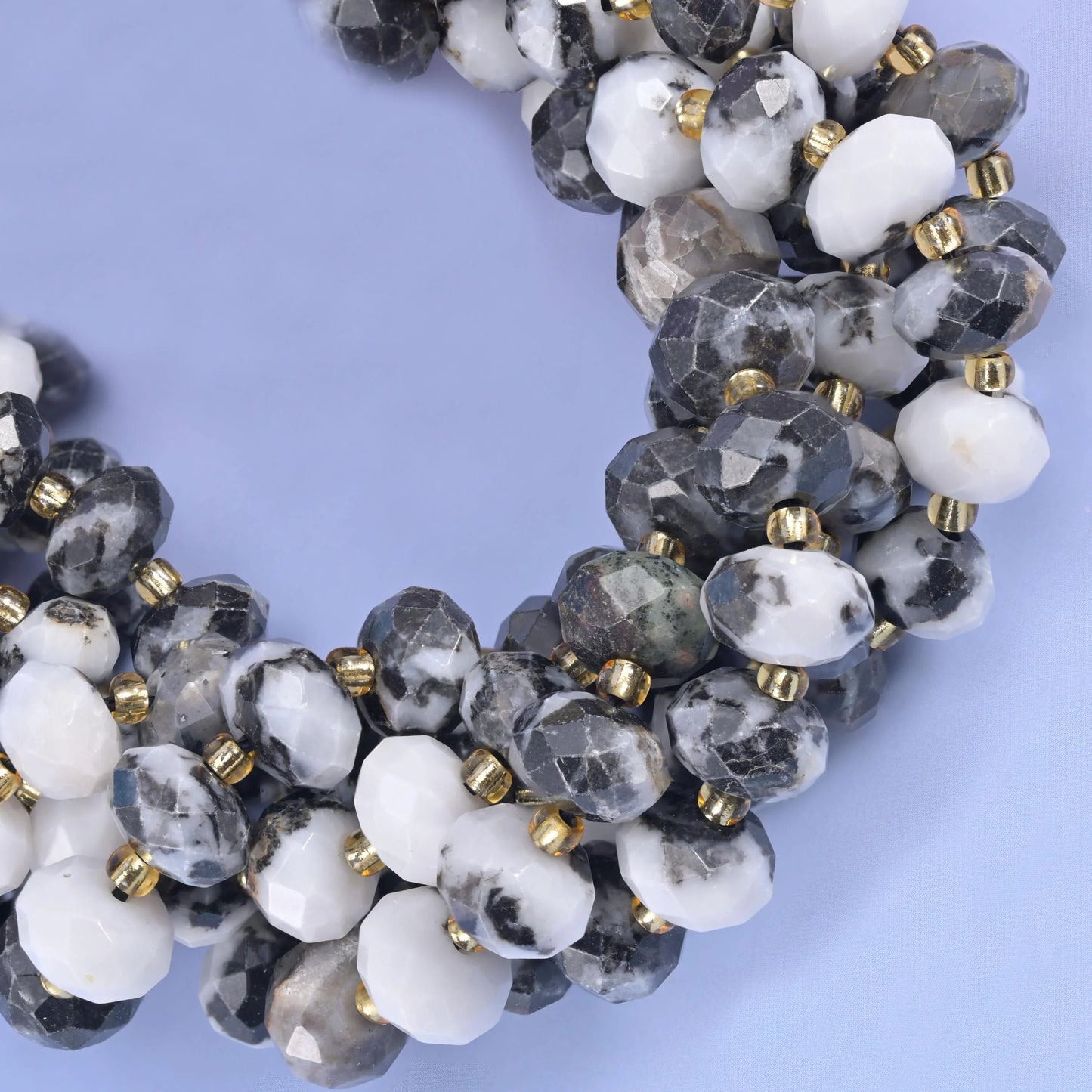 Faceted rondelle cut zebra jasper beads