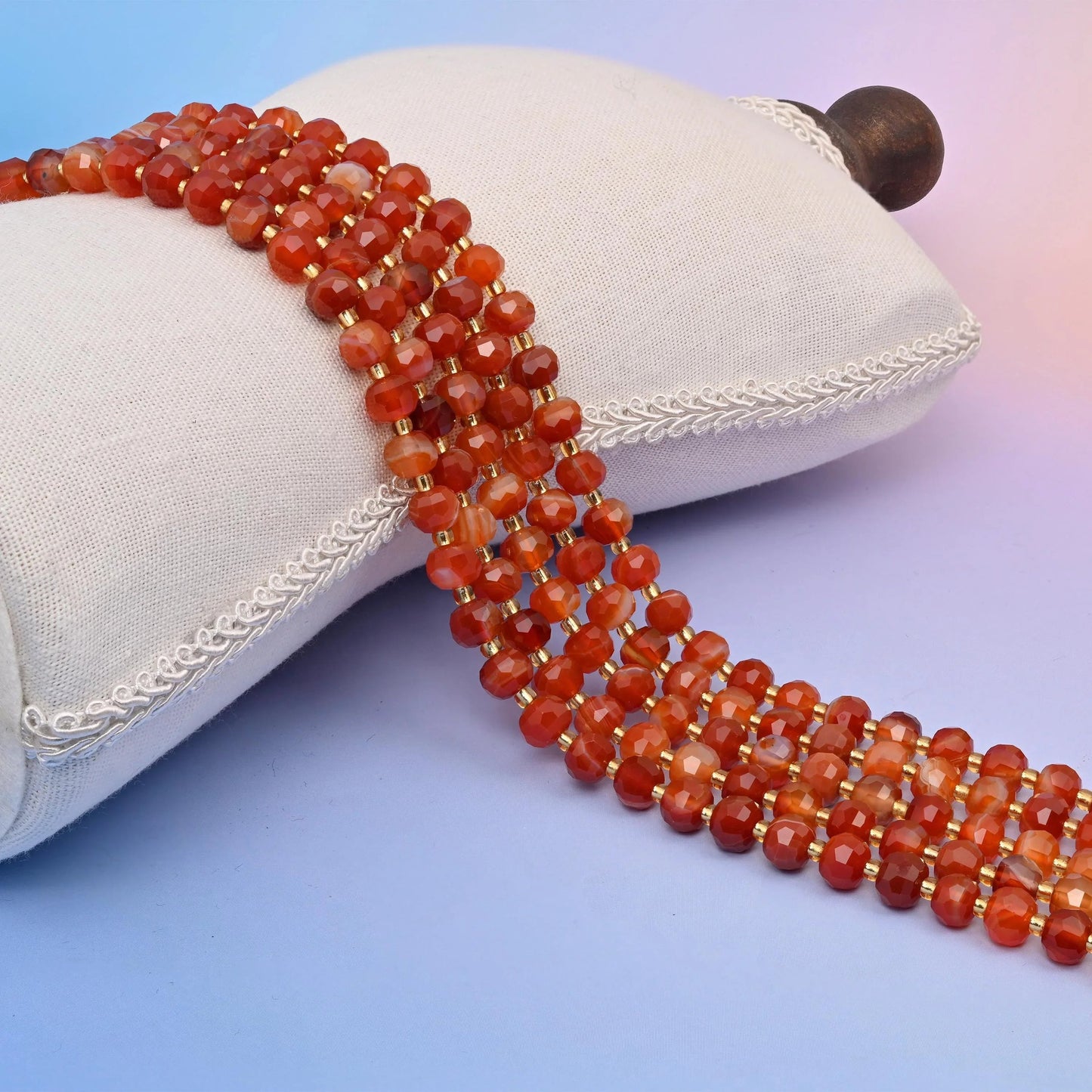 Red Strip Agate Faceted Rondelle Beads in warm brick red and burnt orange banded with milky cream.